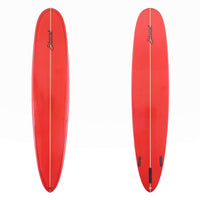 Two red surfboards shown from the top and bottom views on a plain white background, with a black script brand name near the nose and a central white line running down the boards.