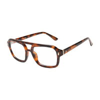 Tortoiseshell eyeglasses on a white background