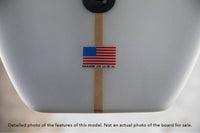 detail of the Made in the USA laminate on the tail of a Ripster single fin longboard