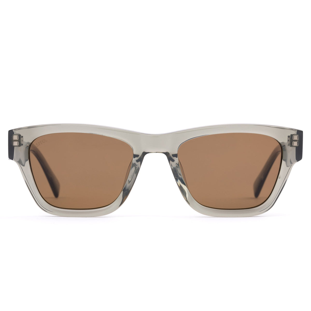Sunglasses with transparent frame and brown lenses on a white background