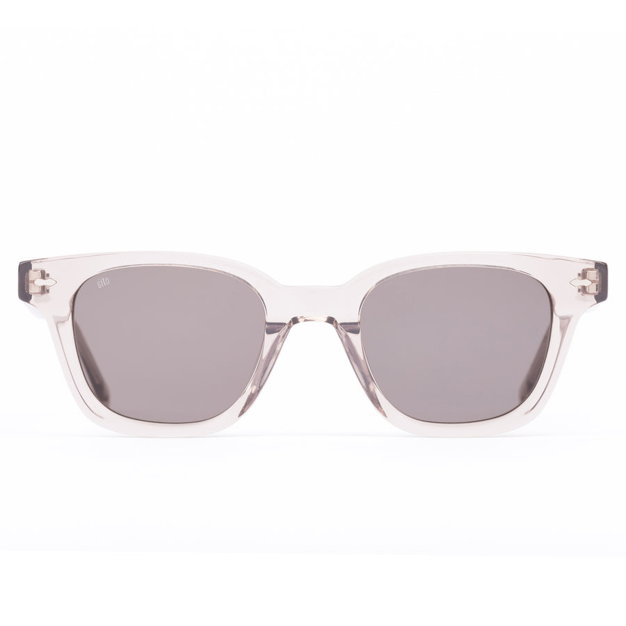 Clear frame sunglasses with gray lenses on a white background