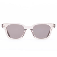 Clear frame sunglasses with gray lenses on a white background