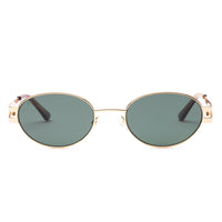 Gold-framed sunglasses with green lenses on a white background