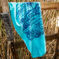 Stewart Shop Collage towel hanging on a rack in bamboo