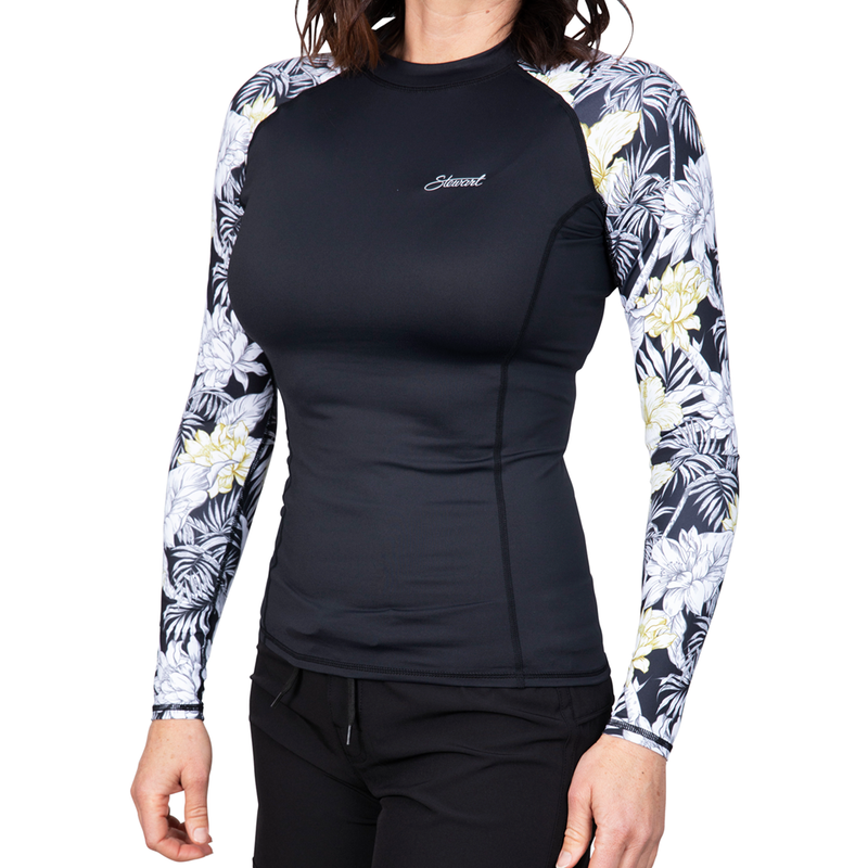 Front view of black rashguard with floral print sleeves on model