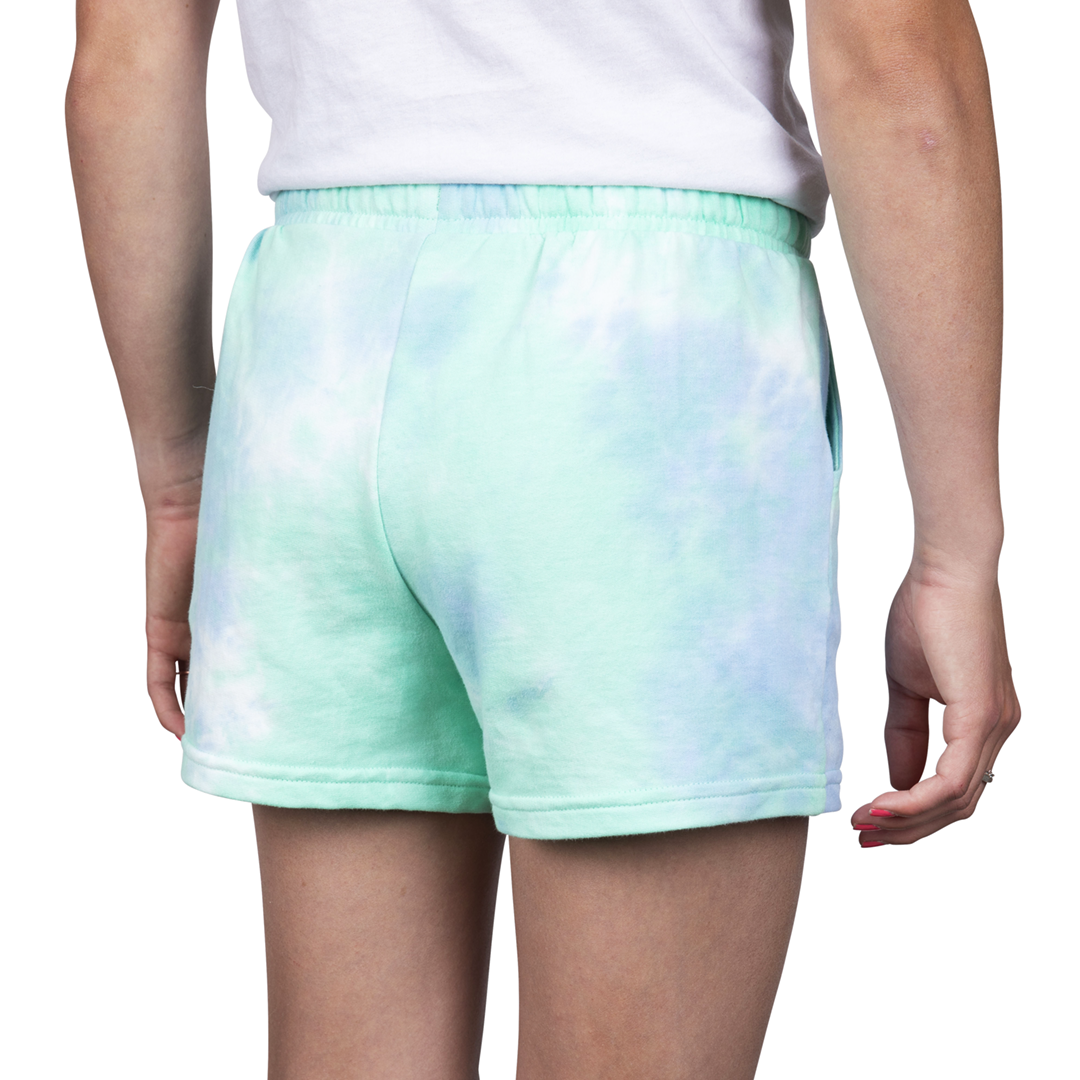 Back view of girl's tie-dye shorts on model