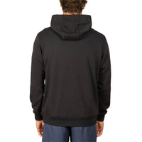A man viewed from the back wearing a plain black pullover hoodie and blue pants against a clean white background.