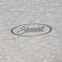 Close-up of a heather gray knit fabric with a dark gray oval logo reading 'Stewart' across the center.
