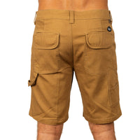 Back view of a person wearing tan cargo shorts with flap pockets and side cargo pockets, shown against a plain white background.