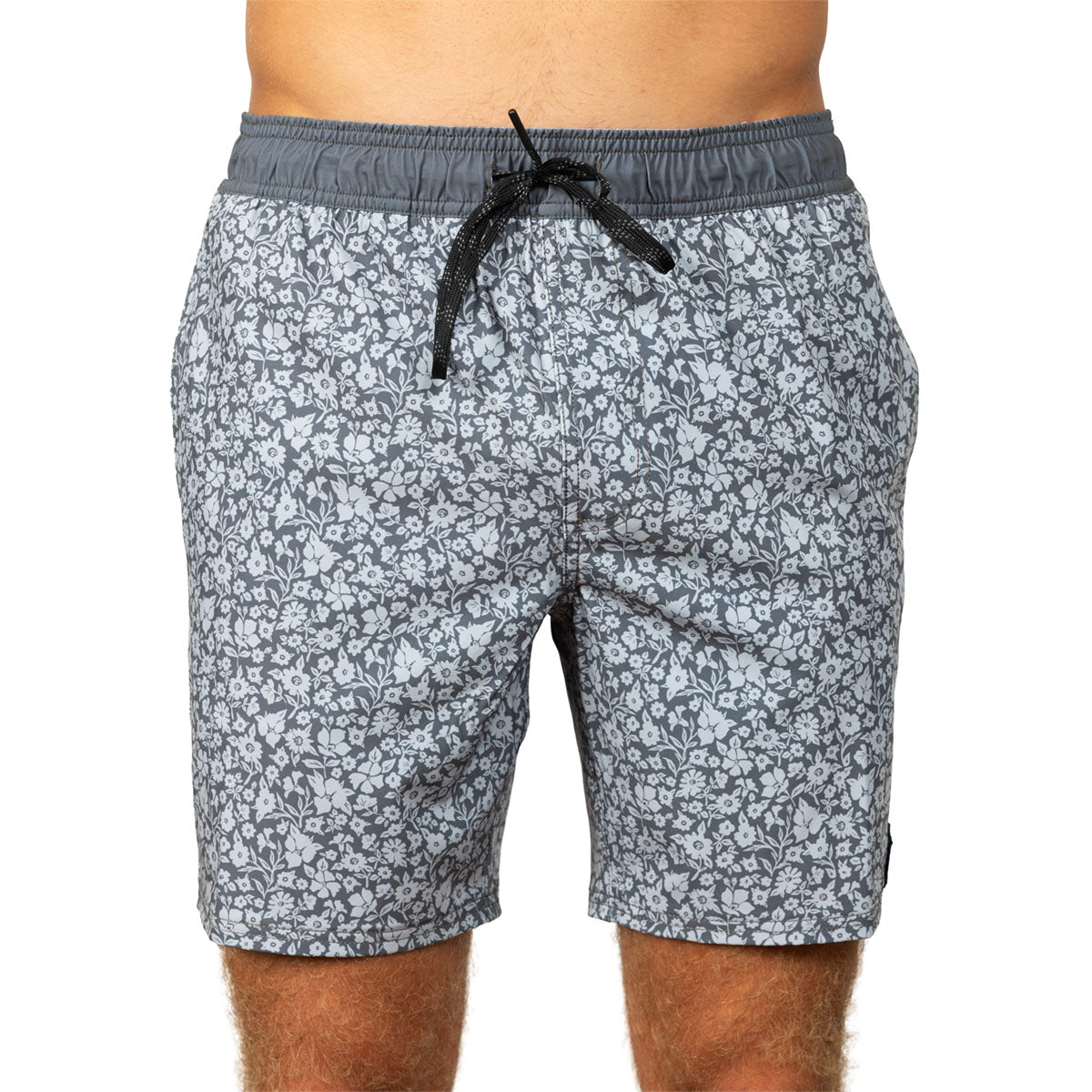Men's swim trunks with a gray and white floral pattern, featuring a dark gray elastic waistband and a black drawstring, shown on a model against a white background.