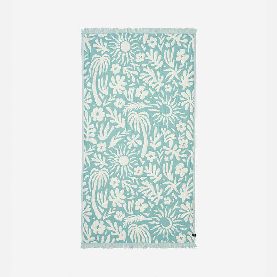 Towel with white floral and leaf pattern on a light blue background