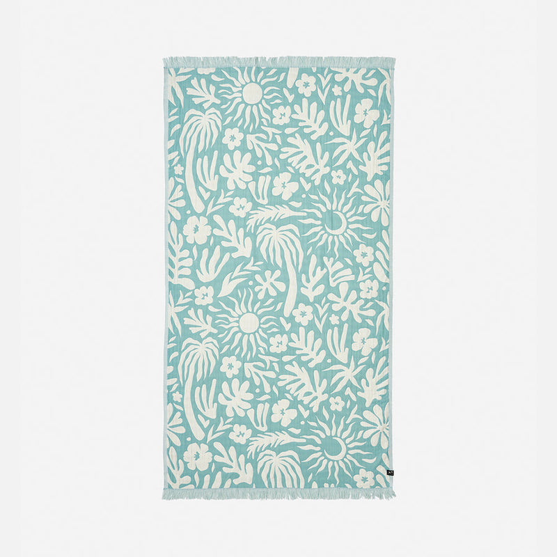Towel with white floral and leaf pattern on a light blue background