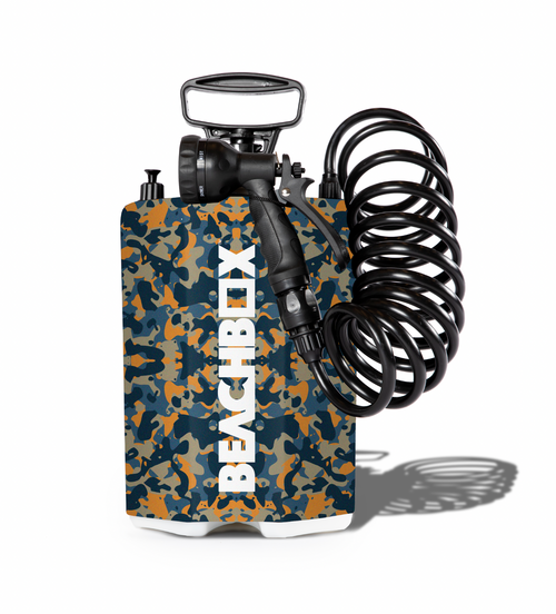 Camouflage-patterned air compressor with 'BEACHBOX' branding on a white background