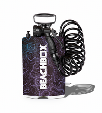 Beachbox inflatable pump with purple and black design on a white background