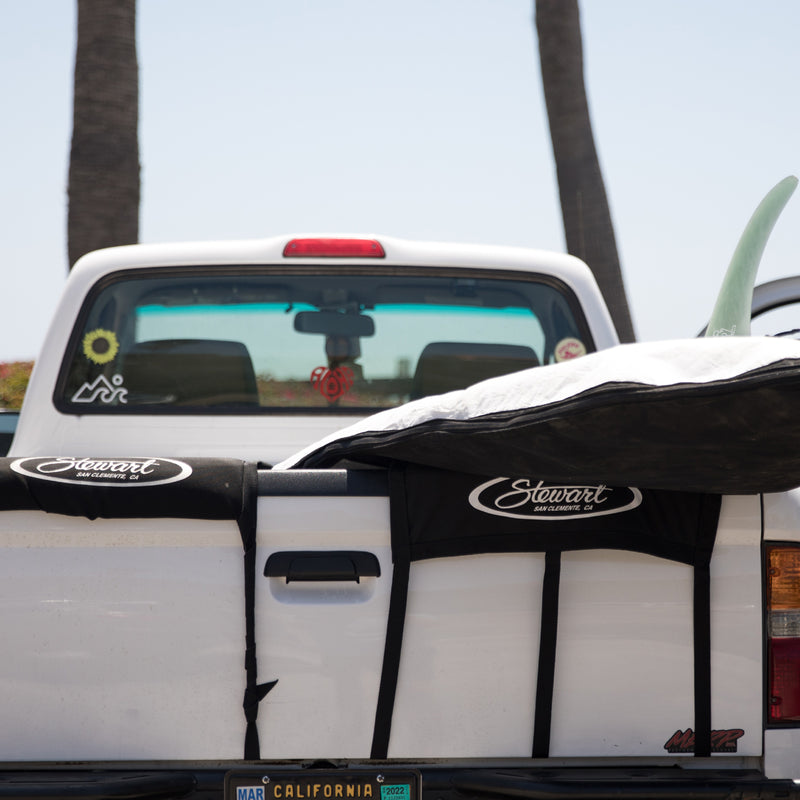 Stewart surfboard car racks on white truck