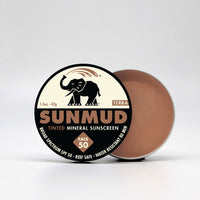 Sunmud tinted mineral sunscreen with packaging on a white background