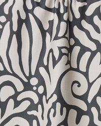 Close-up of fabric with abstract pattern on a dark background