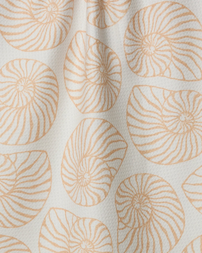 Pattern of shell-like shapes in orange on a beige background