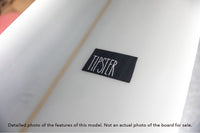 detail of the deck and logo on a Tipster single fin longboard