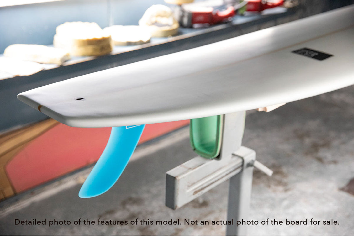 detail of the tail on a Tipster single fin longboard