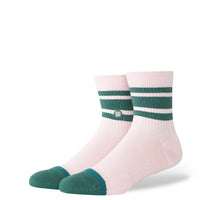 Pink socks with green stripes on a white background