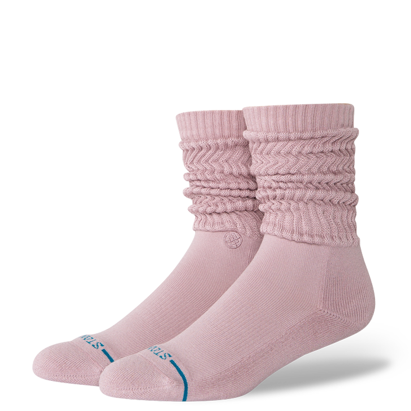 Pair of pink socks with textured pattern on a white background