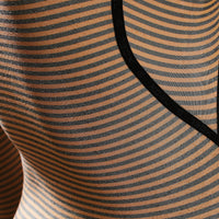 Close-up of a striped fabric with brown and black horizontal lines.