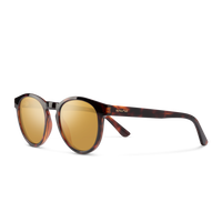 Sunglasses with tortoiseshell frame and gold lenses on a white background