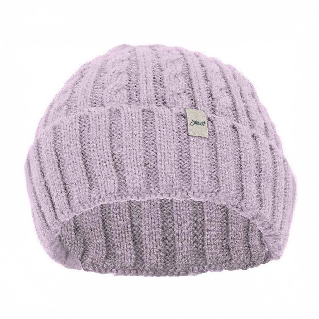 Knitted beanie with a brand label on a white background