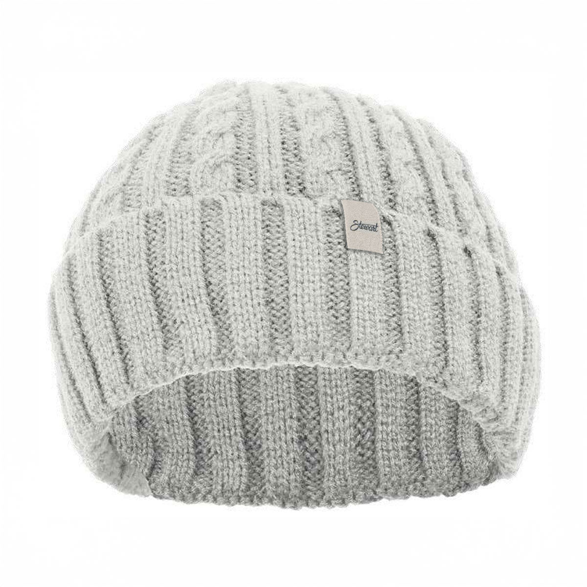 Knitted beanie with a brand label on a white background
