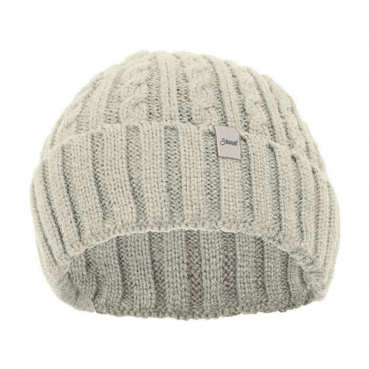 Knitted beanie with a brand label on a white background