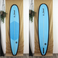 Deck and bottom view of a used Stewart Ripster Longboard with Blue deck and bottom and black rails with sand finish 