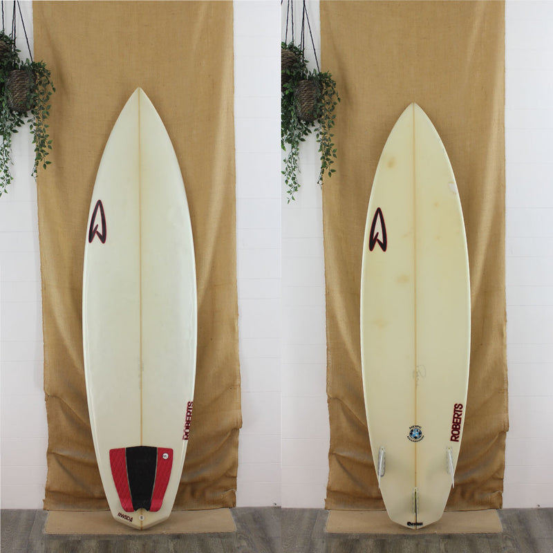 USED Roberts 7'2" x 22 1/2" x 3 1/16" Poly Short Board clear glassjob with red logos and red traction pad