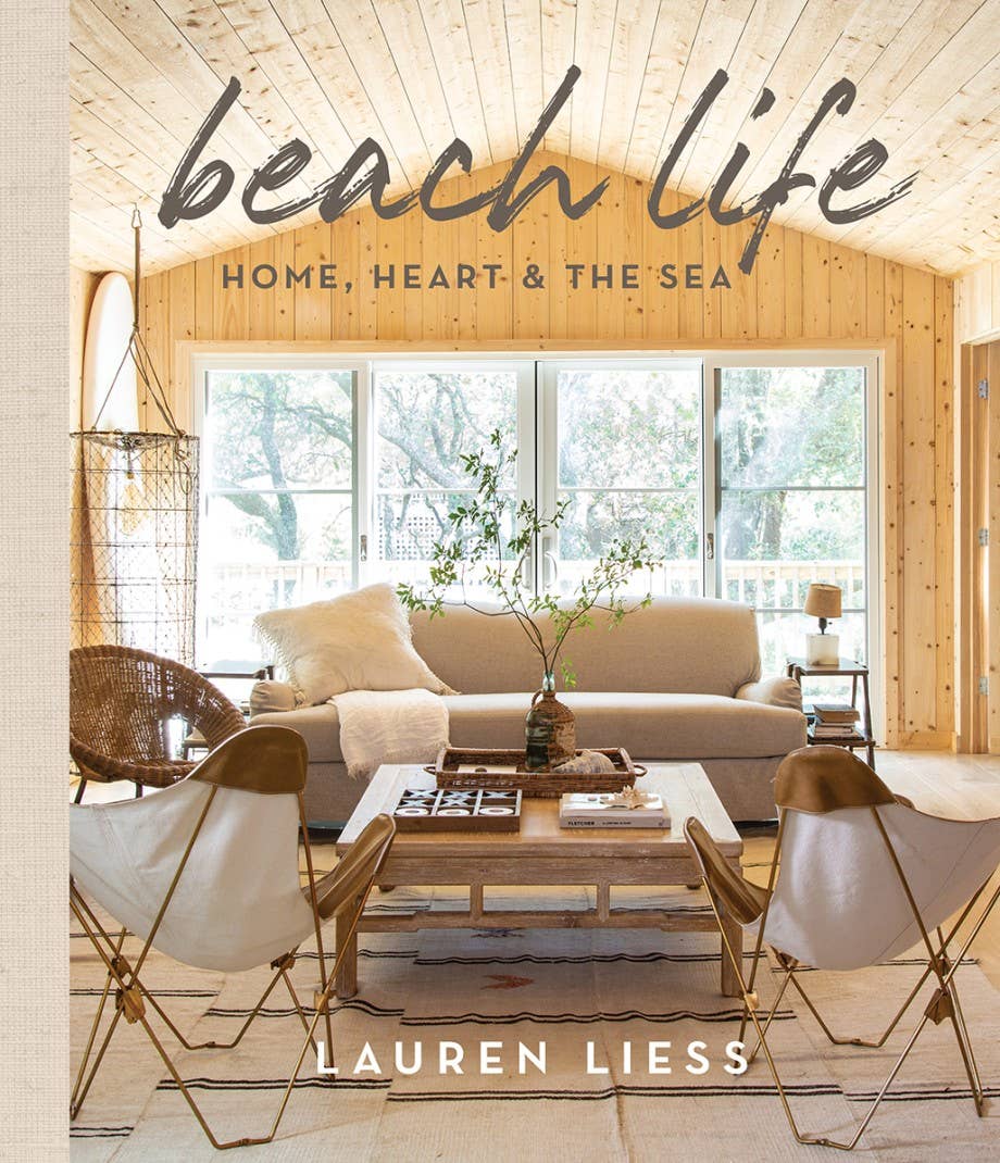 Book cover of 'Beach Life: Home, Heart & The Sea' by Lauren Liess with a living room scene.