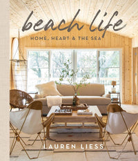 Book cover of 'Beach Life: Home, Heart & The Sea' by Lauren Liess with a living room scene.