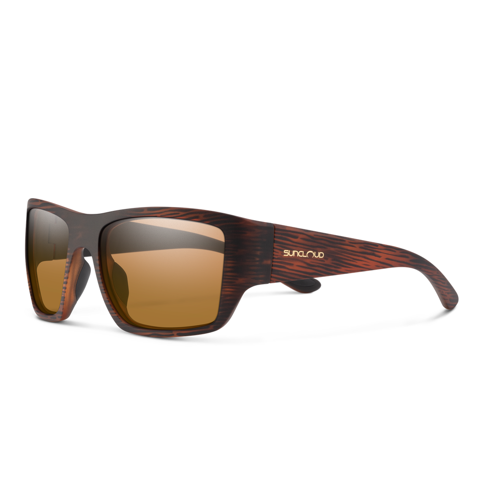 Sunglasses with wooden frame and brown lenses on a white background