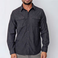 Dark gray button-up shirt worn by a person on a light gray background