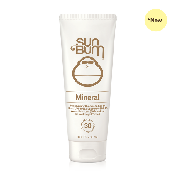 A tube of SUN BUM Mineral Sunscreen Lotion with SPF 30 indicated on the packaging.