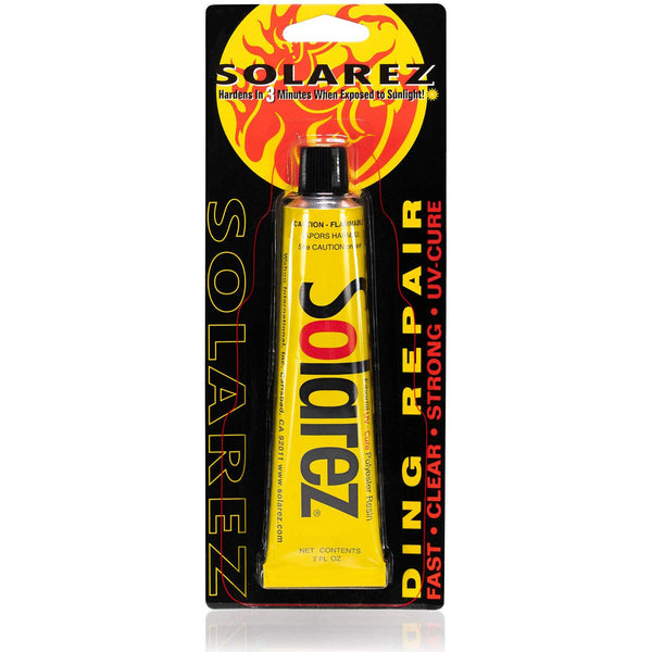 A tube of SOLAREZ POLY DING REPAIR RESIN with a yellow label, placed on a black background with the brand name and product details printed above it.
